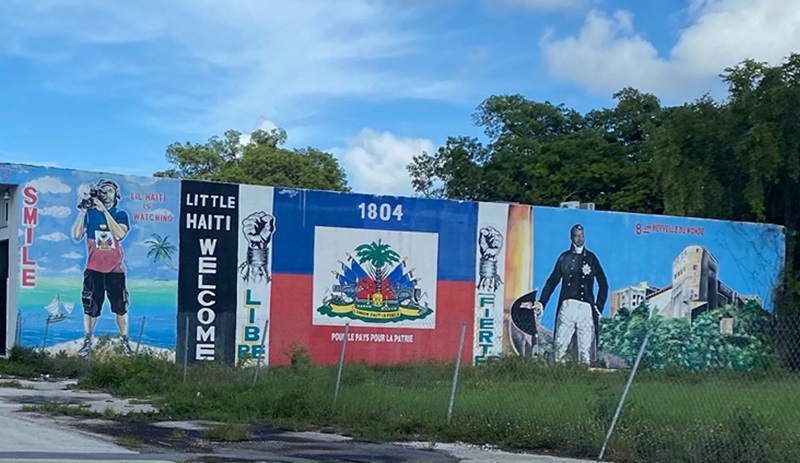 Historic mural welcoming visitors to Little Haiti (Miami, Florida). The mural includes Haiti’s flag and the Citadelle Laferrière, which is a famous structure in Haiti that symbolizes Haiti’s independence.